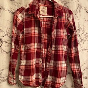 An array of pink in this button down flannel, size xs